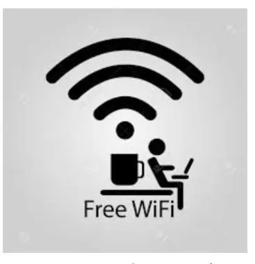 a free wifi sign with a person sitting on a computer at Ikebukuro 702 in Tokyo