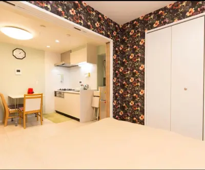 a room with a kitchen and a dining room at Ikebukuro 702 in Tokyo