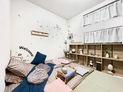 a living room with a couch and a table at Otsuka House-TS0006 in Tokyo