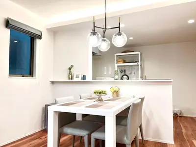 a dining room with a white table and chairs at Otsuka House-TS0006 in Tokyo