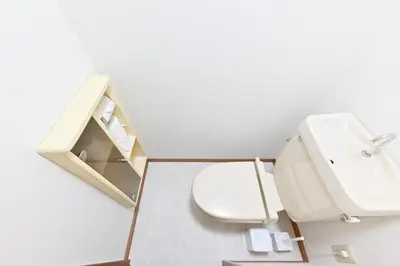 a bathroom with a toilet and a sink at Private Villa Sinjuku -7min to \u9ad8\u7530\u99ac\u5834\u99c5 in Tokyo