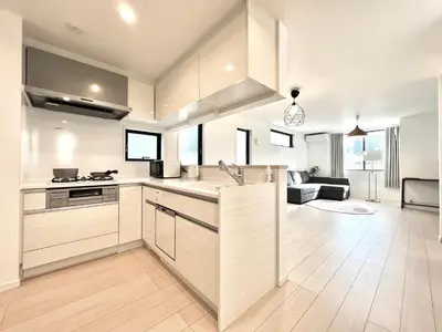 a kitchen with white cabinets and a living room at \u590f\u91ce-\u9ad8\u7530\u9a6c\u573a-sSJ0106 in Tokyo