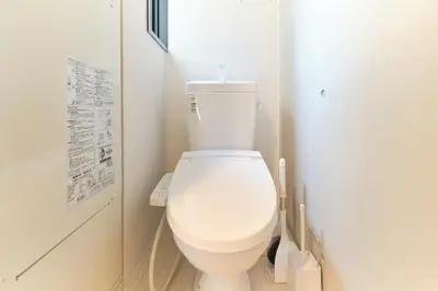 a bathroom with a white toilet in a room at Blighton Miyoshi by Tranova in Tokyo