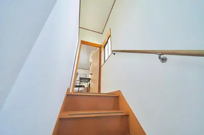 a stairwell in a house with a window at TOMARIE Residential Suite Higashi-Tateishi in Tokyo