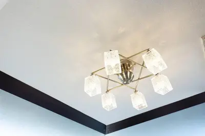 a chandelier hanging from a ceiling in a room at shinjuku, tokyo city hall, apartment, Hotel for Max 6 person in Tokyo