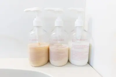 a row of bottles of detergents sitting on a shelf at shinjuku, tokyo city hall, apartment, Hotel for Max 6 person in Tokyo
