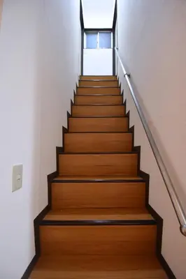 a staircase with wooden treads in a building at Shinozaki Kodate - Vacation STAY 16392 in Tokyo