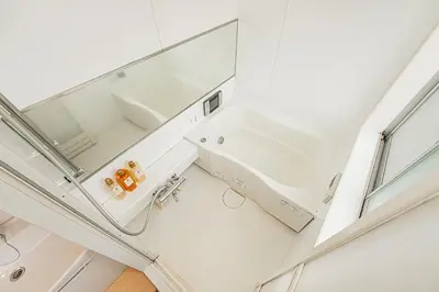 a bathroom with a sink and a mirror at self-check in-\u5927\u585a\u99c5One minute in Tokyo