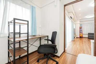 an office with a desk and a chair in a room at self-check in-\u5927\u585a\u99c5One minute in Tokyo