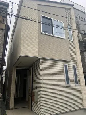 a building with its door open on a street at 89, Yahiro 1, Detached House for Rent, \u516b\u5e831 in Tokyo