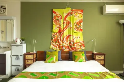 a bedroom with a bed with a canopy above it at The Ivy Apartments, BEST Location, Yoyogi!! in Tokyo