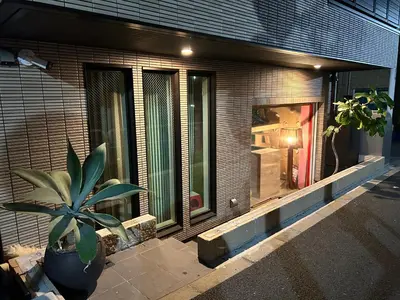 a potted plant sitting in front of a building at Lab8 Tokyo - Creative Coliving & Group Stay 6 Minutes to Shibuya Stay Play & Connect in Tokyo