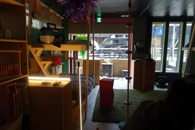 a living room filled with lots of boxes and a room at Lab8 Tokyo - Creative Coliving & Group Stay 6 Minutes to Shibuya Stay Play & Connect in Tokyo