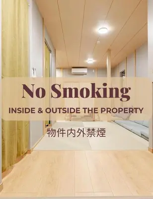 a room with no smoking inside and outside the property wall sticker at \u65b0\u5bbf6 Home in Tokyo