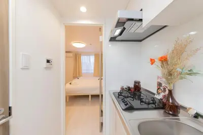 a kitchen with a sink and a counter top at FL Residence Shinjuku Gyoen V in Tokyo