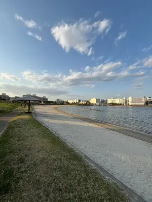 a beach next to a body of water at Familia Heiwajima in Tokyo
