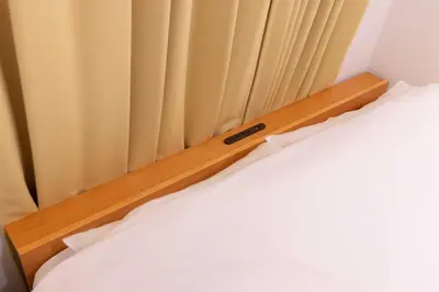 a close up of a bed with a curtain at \u30b8\u30a7\u30df\u30cb\u30b9\u6c60\u888b203 in Tokyo