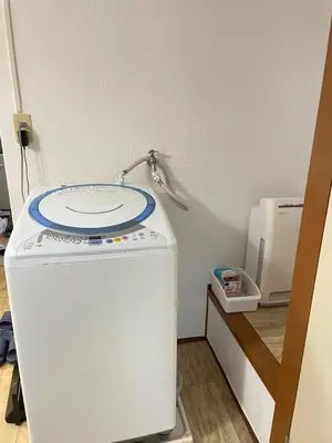a small refrigerator with a plate on top of it at Nishi-shinjuku-ZYZ SJ0237 in Tokyo