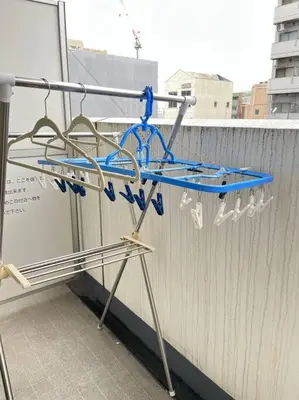 a metal rack on the side of a balcony at 801 5mins from JR Kinshicho! Near Asakusa&Skytree! in Tokyo