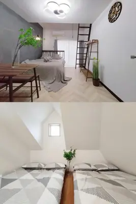 a room with two beds and a table in a room at 202 Shinjuku center- 10mins from shinjuku st a- 2mins Okubo- Max6p-2room-\u6d89\u8c37\u516d\u672c\u6728\u94f6\u5ea7\u76f4\u8fbe in Tokyo