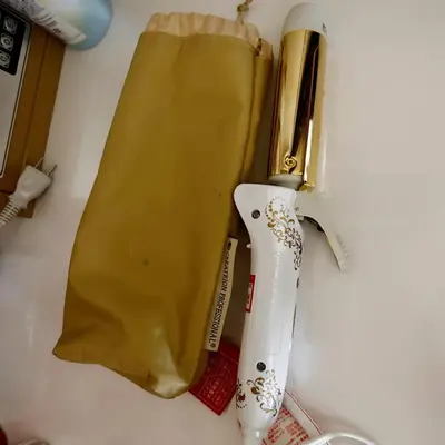 a yellow bag and a knife on a counter at Lucky House\u65b0\u5bbf11 in Tokyo