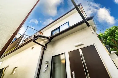 a building with a window on the side of it at 29, Omori-kita, Private house rental, \u5927\u68ee\u5317 in Tokyo