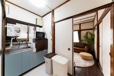 a kitchen with a sink and a toilet in a room at Shinjuku , 3min walk Okubo Sta, net, PocketWi-Fi, Switch in Tokyo