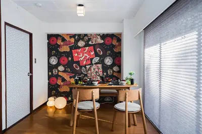 a dining room with a table and two chairs at Akihabara Area! Direct to Shibuya, Narita, Haneda in Tokyo