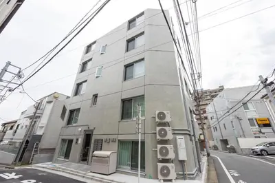 a building on the side of a street at Mat\u91ce\u65b9 in Tokyo