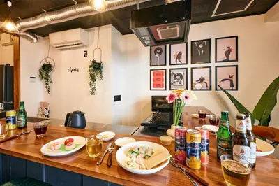 a kitchen counter with plates of food and drinks on it at \u548c\u6c23\u4f1a\u3005\u91ce\u65b9 Wakiaiai Nogata in Tokyo