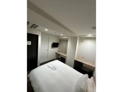 a bedroom with a white bed in a room at ELE HOTEL HIGASHI NIHONBASHI - Vacation STAY 01234v in Tokyo