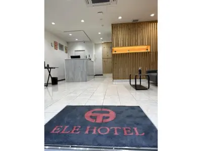 a large lobby with a blue hotel rug on the floor at ELE HOTEL HIGASHI NIHONBASHI - Vacation STAY 01234v in Tokyo
