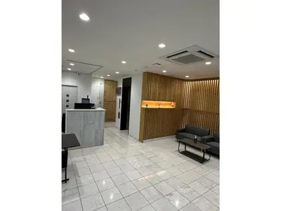 an office lobby with a chair and a desk at ELE HOTEL HIGASHI NIHONBASHI - Vacation STAY 01234v in Tokyo