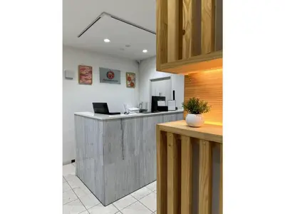 a lobby with a counter with a laptop on it at ELE HOTEL HIGASHI NIHONBASHI - Vacation STAY 01234v in Tokyo