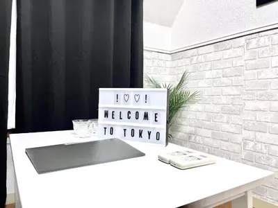 a white table with a sign that says welcome to today at Ikebukuro Sugamo \u99c5\u8fd1 C02 in Tokyo