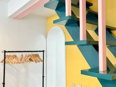 a room with a colorful wall with a shelf at \u6c60\u888b2\u5206\u6700\u592712\u4eba\u53ef in Tokyo