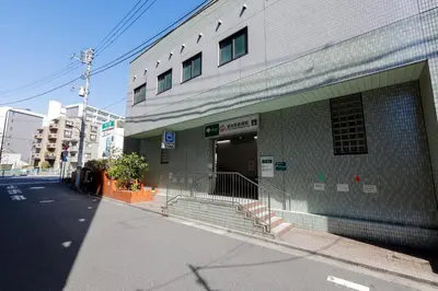 a building on the side of a street at \u30ec\u30d4\u30e5\u30a2\u897f\u843d\u5408\u30ec\u30b8\u30c7\u30f3\u30b9 in Tokyo
