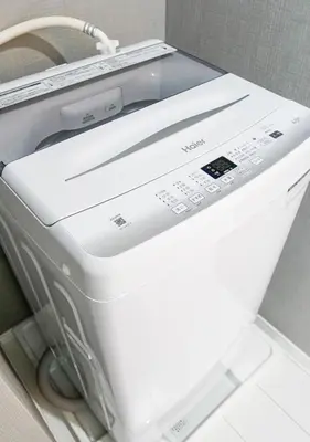 a computer printer sitting on a shelf in a room at Asakusabashi Condominium Hotel in Tokyo