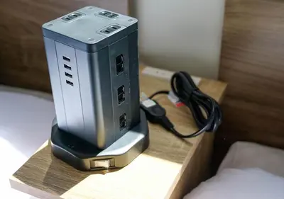 a router sitting on top of a wooden table at Asakusabashi Condominium Hotel in Tokyo