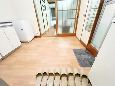 a hallway of an office with a row of chairs at \u9ad8\u7530\u99ac\u58344\u5206 4\u4eba\u53ef 203 in Tokyo