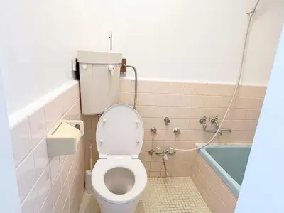 a bathroom with a toilet and a bath tub at 東新宿1分&新大久保10分 in Tokyo