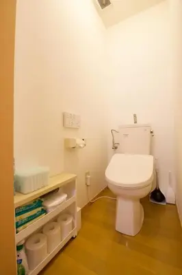 a bathroom with a white toilet in a room at \u30cf\u30a4\u30b0\u30ec\u30fc\u30c9\u7acb\u77f3 101 in Tokyo