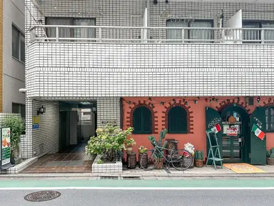 a building with bikes parked in front of it at TRAVELERZ Tokyo Akasaka in Tokyo