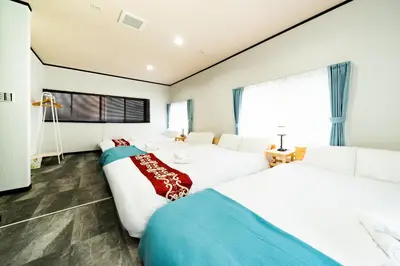 two white beds in a room with a window at 39, Kanegafuchi 2, Entire house for rent, \u9418\u30f6\u6df52 in Tokyo