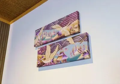 two pieces of art on display on a wall at Yadoya Suzume - Vacation STAY 60192v in Tokyo