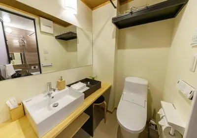 a bathroom with a white toilet and a sink at Yadoya Suzume - Vacation STAY 60192v in Tokyo
