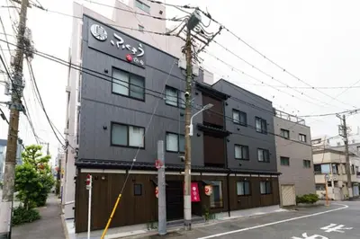 a building on the corner of a street at Ydoya Fukuro - Vacation STAY 52727v in Tokyo