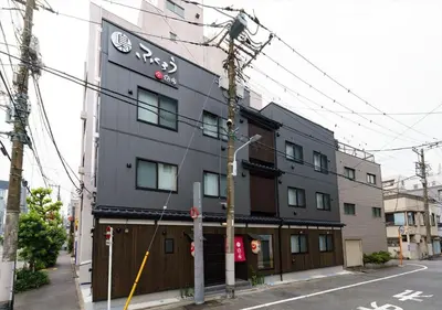 a building on the corner of a street at Ydoya Fukuro - Vacation STAY 52727v in Tokyo
