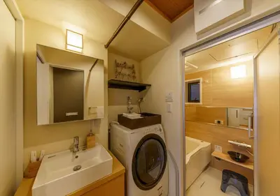 a bathroom with a washing machine and a sink at Ydoya Fukuro - Vacation STAY 52727v in Tokyo