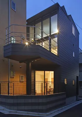 a large house with a balcony on the side of it at Spacious Home in Ebisu Heart of Tokyo in Tokyo